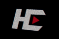 he logo scanlines with red triangle.webp